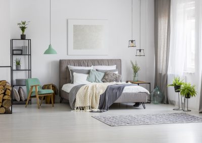 Green and silver spacious bedroom